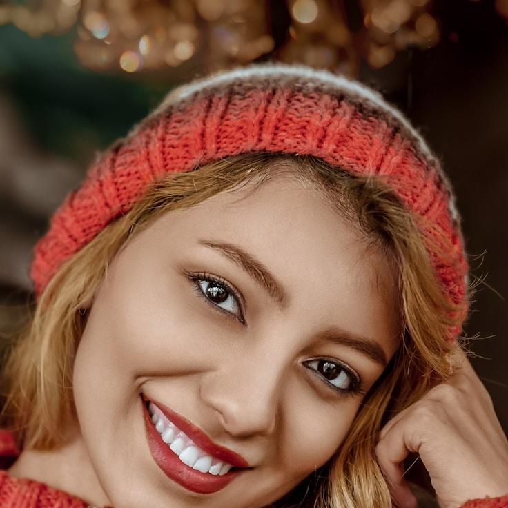 Kaveri Mehta, Lead Design Curator at MarbleHarborCrest, reviewing corporate floral arrangements